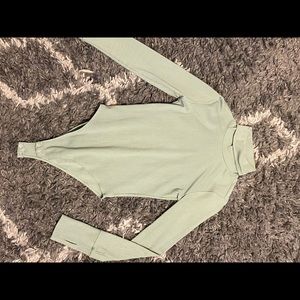 Green turtle neck body suit